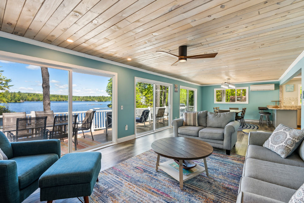 Upper living room with views of the lake and access to the upper deck