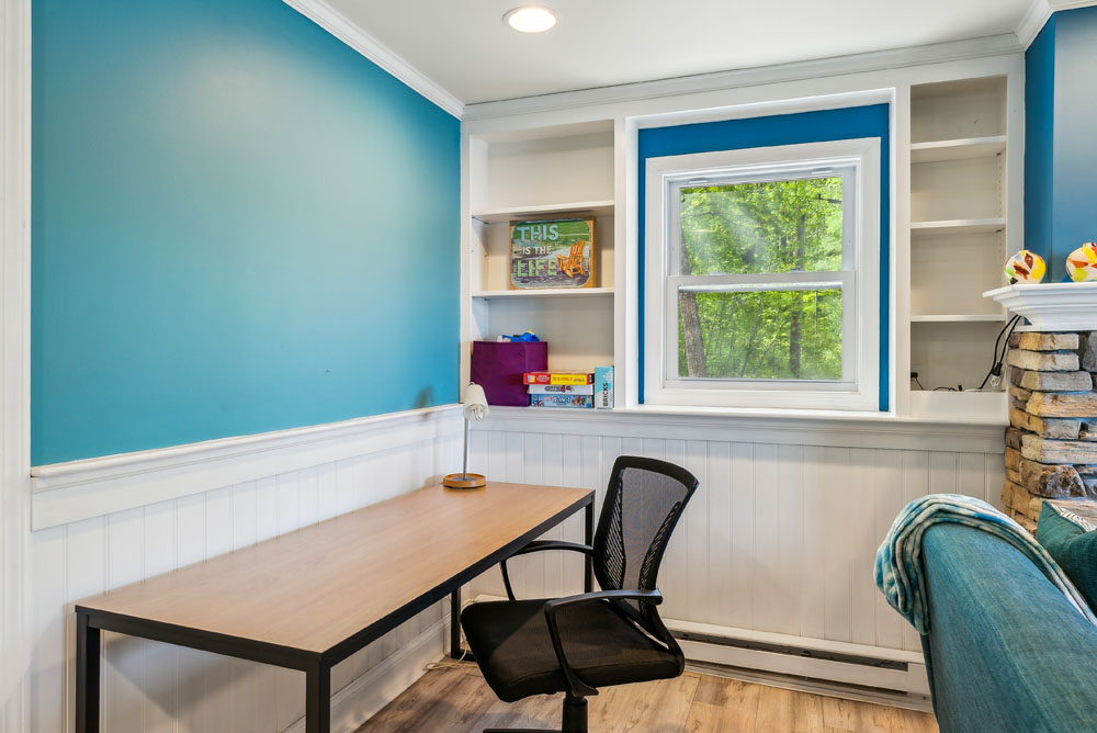 Desk and office chair in the lower living room space